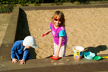 Image showing Children play on the sands