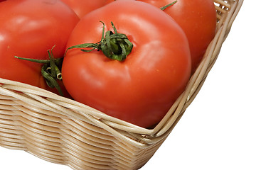 Image showing Basket with tomatoes on white background with clipping path