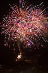 Image showing Fireworks over a town