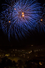 Image showing Fireworks over a town