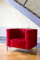 Image showing Red armchair and stairs