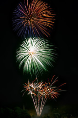 Image showing Fireworks over a town