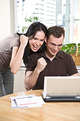 Image showing Happy couple online banking