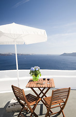 Image showing view from house patio of volcanic islands of santorini