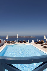 Image showing swimming pool over sea santorini