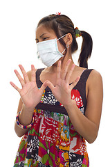 Image showing protective face mask on asian woman