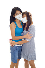Image showing protective face mask on asian women