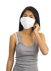 Image showing protective face mask on asian woman