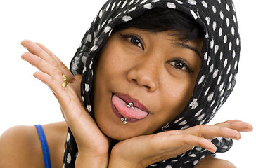 Image showing asian with pierced tongue 