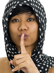 Image showing asian with finger on her lips