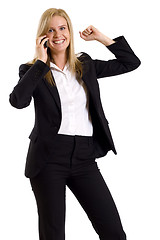 Image showing attractive businesswoman on the phone winning