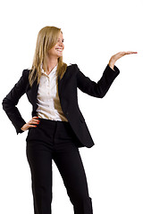 Image showing attractive businesswoman presenting something