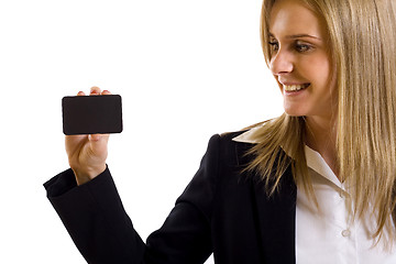 Image showing attractive businesswoman holding a blank card