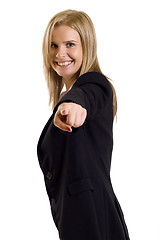 Image showing attractive businesswoman pointing at you