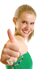 Image showing portrait of an attractive young girl making her ok sign