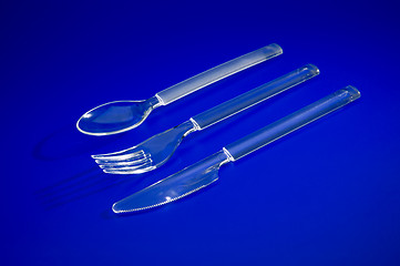 Image showing Plastic cover set on blue background