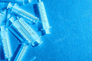 Image showing luminous medical syringes