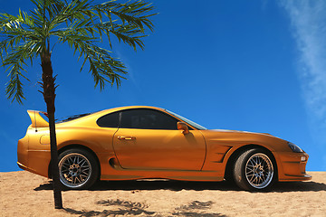 Image showing Sport Car on Gold Sand