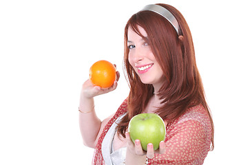 Image showing woman with apple and orange