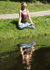 Image showing girl on coast of the lake