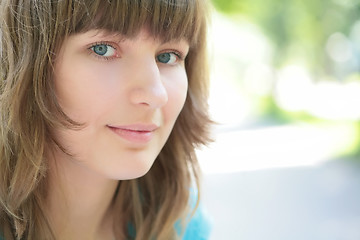 Image showing smiling green-eyed girl