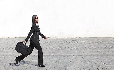 Image showing Businesswoman in a hurry