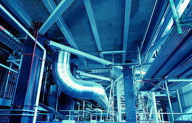 Image showing Pipes, tubes, machinery and steam turbine at a power plant