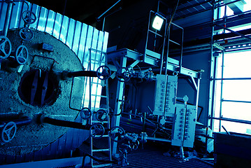 Image showing Pipes, tubes, machinery and steam turbine at a power plant