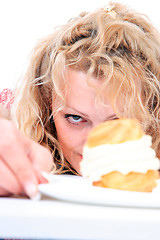 Image showing Woman eating cake