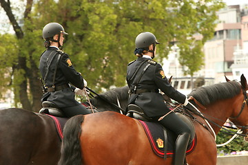 Image showing Riding police