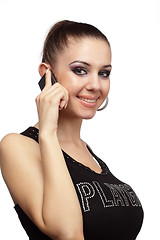 Image showing Cheerful woman talking on a phone