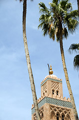 Image showing koutubia mosque minaret with palm trees in koutubia gardens marr