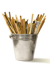 Image showing various chopsticks in bucket for champagne