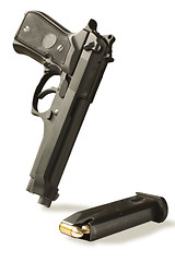 Image showing handgun  and magazine