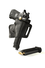 Image showing handgun in holster and magazine