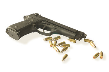 Image showing semi-autos gun with fourteen bullets