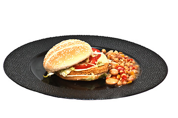 Image showing Chicken burger with bean sallad
