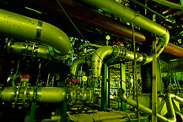 Image showing Pipes, tubes, machinery and steam turbine at a power plant