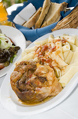 Image showing lamb with pasta and greek salad taverna restaurant 