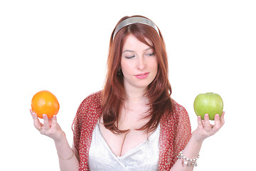Image showing Pretty woman with fruits