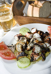 Image showing greek island taverna specialty marinated grilled octopus
