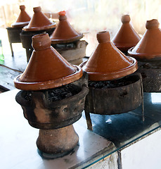 Image showing tagines cooking at restaurant in morocco africa