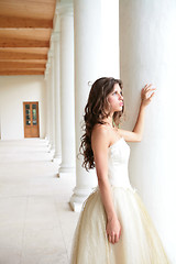 Image showing bride near pillars