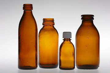 Image showing Four Brown Vials