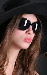 Image showing black sunglasses on the woman face