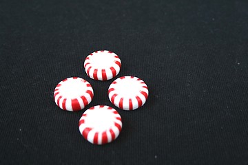 Image showing Four peppermint candies