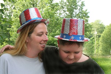 Image showing Mother and son wearing 4th of july hats