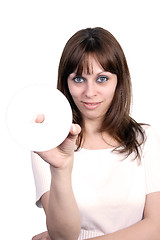 Image showing Young beautiful woman holding a cd.