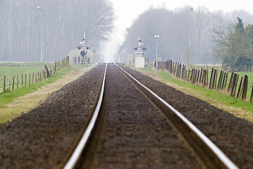 Image showing Railtrack with hazy crossing.