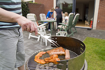 Image showing Meat and kebabs on barbecue.